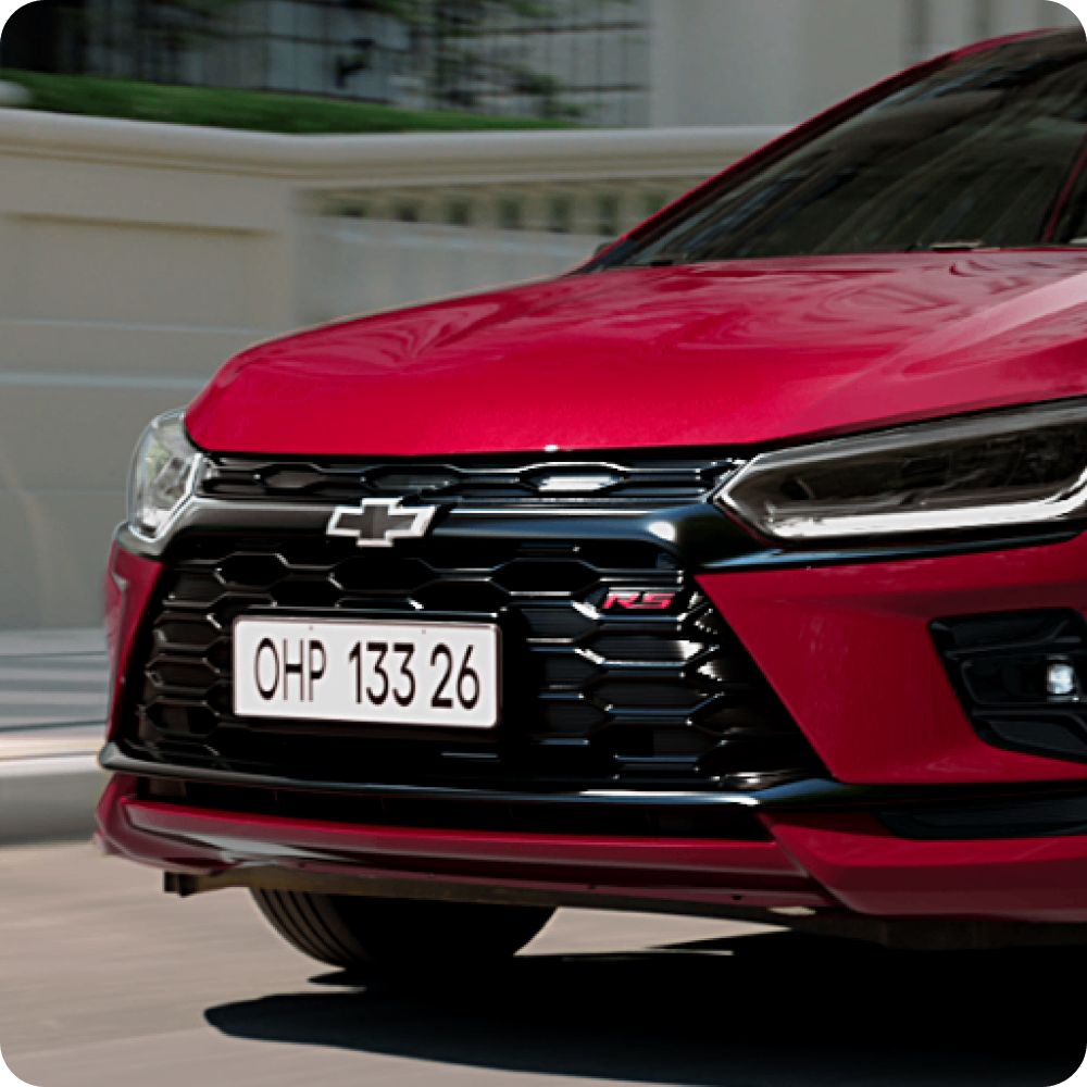 Foto da grade frontal estilo colmeia do Chevrolet Onix 2026 versão RS.