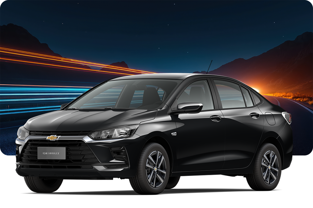 Chevrolet Onix LT AT Turbo na cor Preto Ouro Negro, com pôr do sol ao fundo.