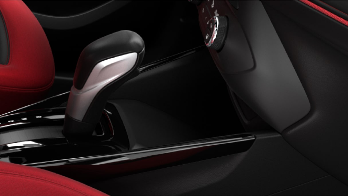 Detalhe do interior do Tracker mostrando o carregador de celular sem fio.