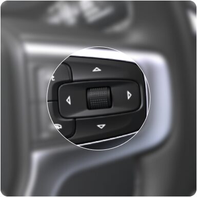 Botões de acesso rápido para controle do MyLink no volante de um Chevrolet.