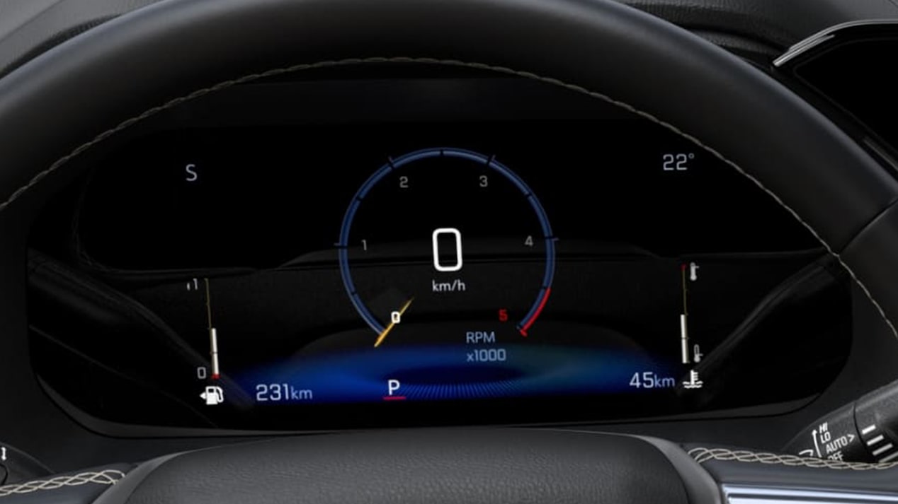 Vista cercana del panel personalizable detrás del volante de la Chevrolet Colorado.