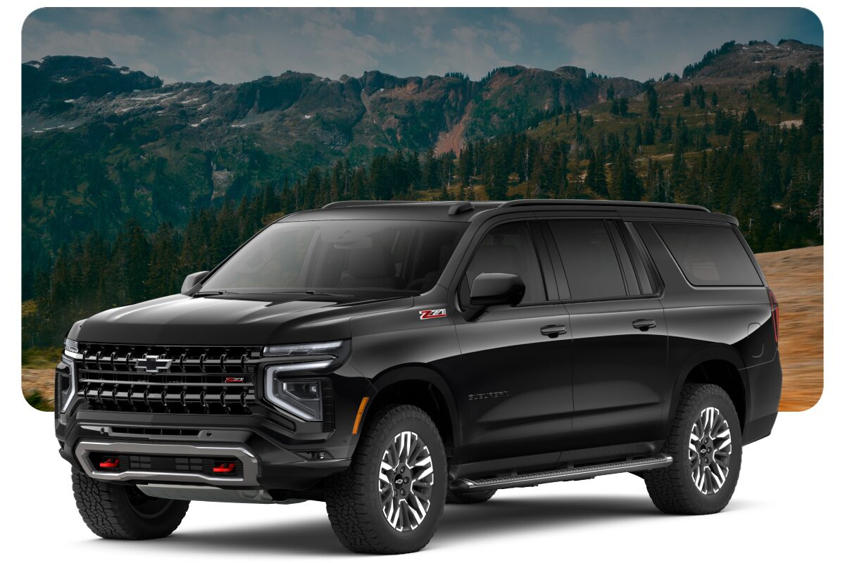 Imagen de una Chevrolet Suburban Z71 sobre el fondo de un paisaje montañoso con pinos.